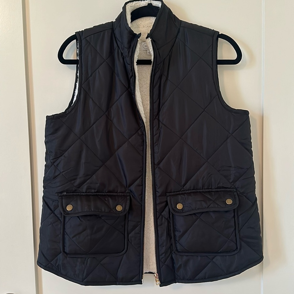 Black vest with fur inside